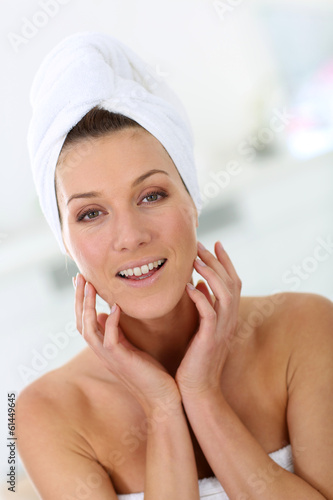 Portrait of attractive woman in bathroom
