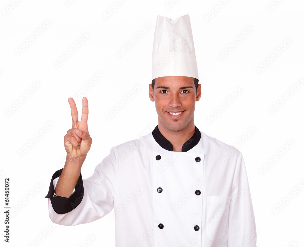 Alone professional chef with victory sign Alone professional chef with victory sign