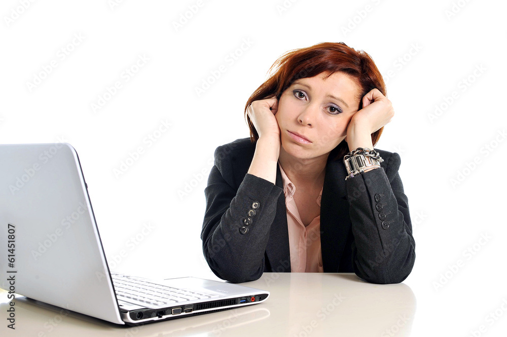 sad business red haired woman in stress at work with computer sad business red haired woman in stress at work with computer