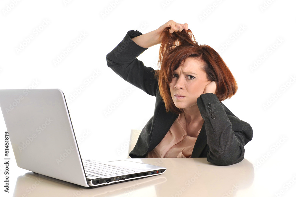 sad business red haired woman in stress at work with computer sad business red haired woman in stress at work with computer