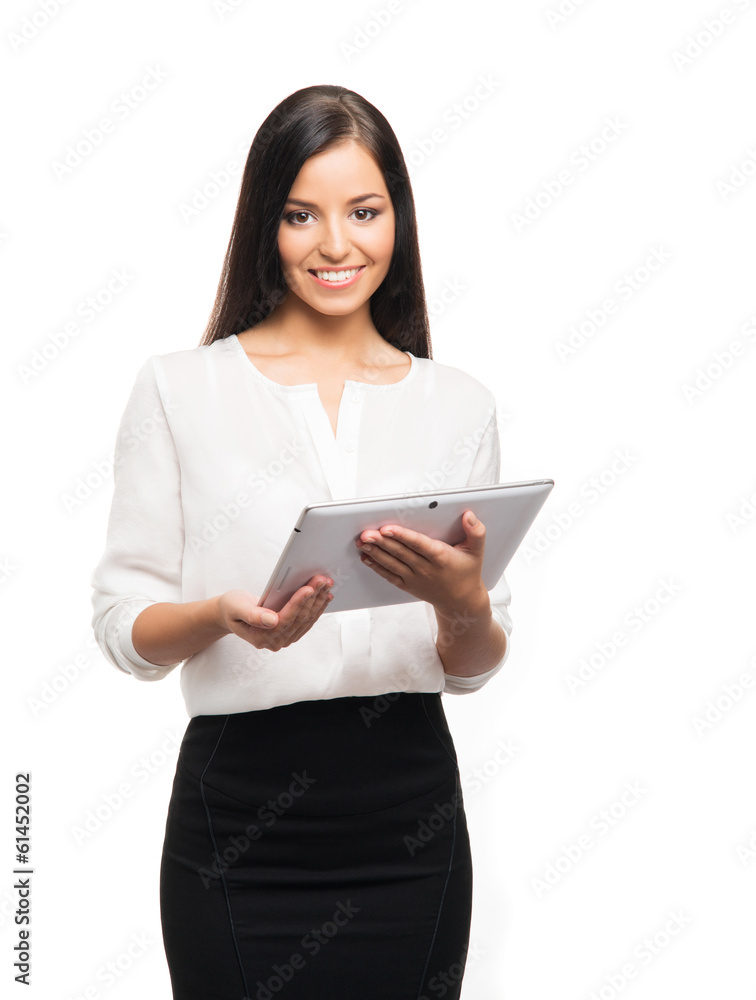 A successful and beautiful businesswoman with a tablet A successful and beautiful businesswoman with a tablet