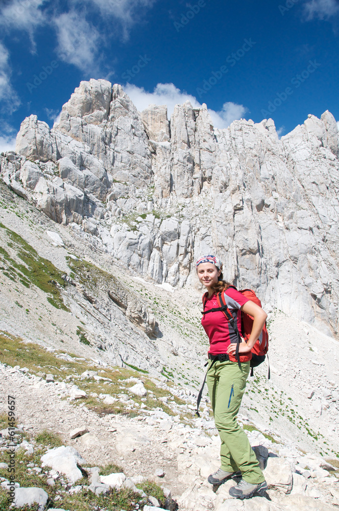 Naklejka premium A smiling girl on the mountain trail, Abruzzo, Italy