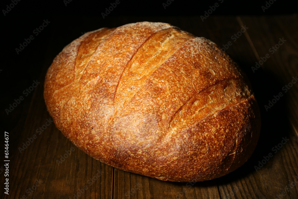 Loaf of bread on dark background