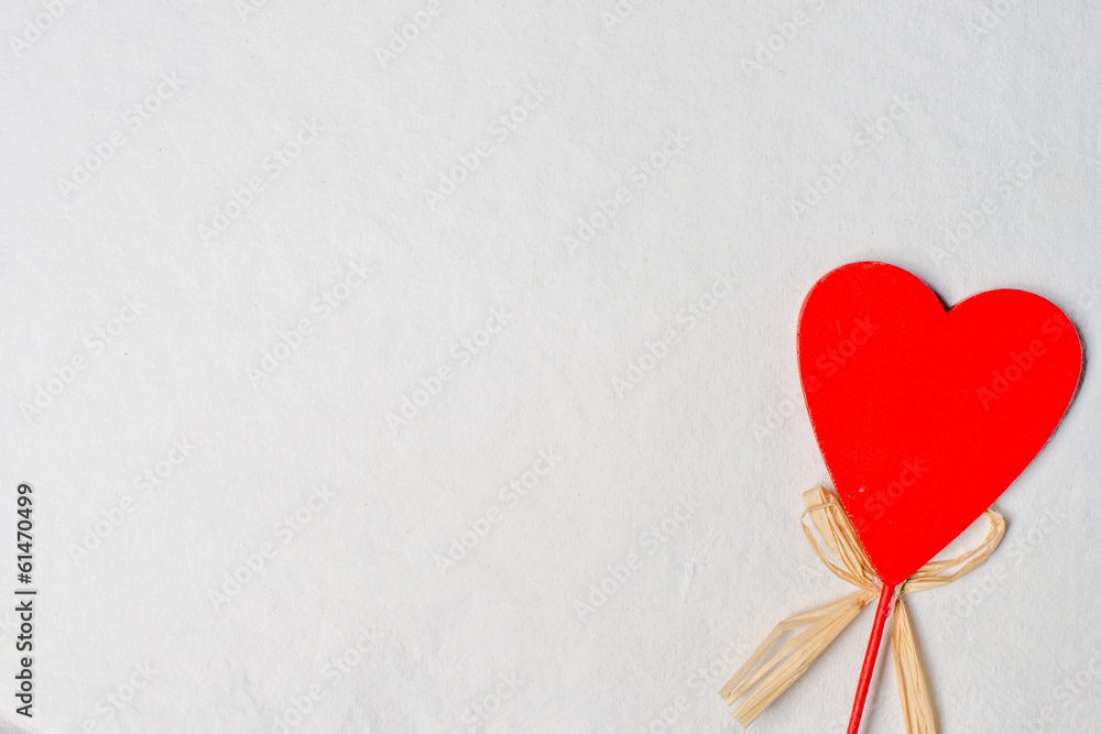 Red wooden heart and white paper card, holiday texture Red wooden heart and white paper card, holiday texture