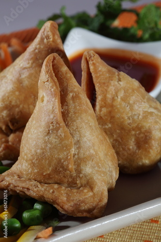 Samosa  is an Indain fried or baked pastry with a savory filling