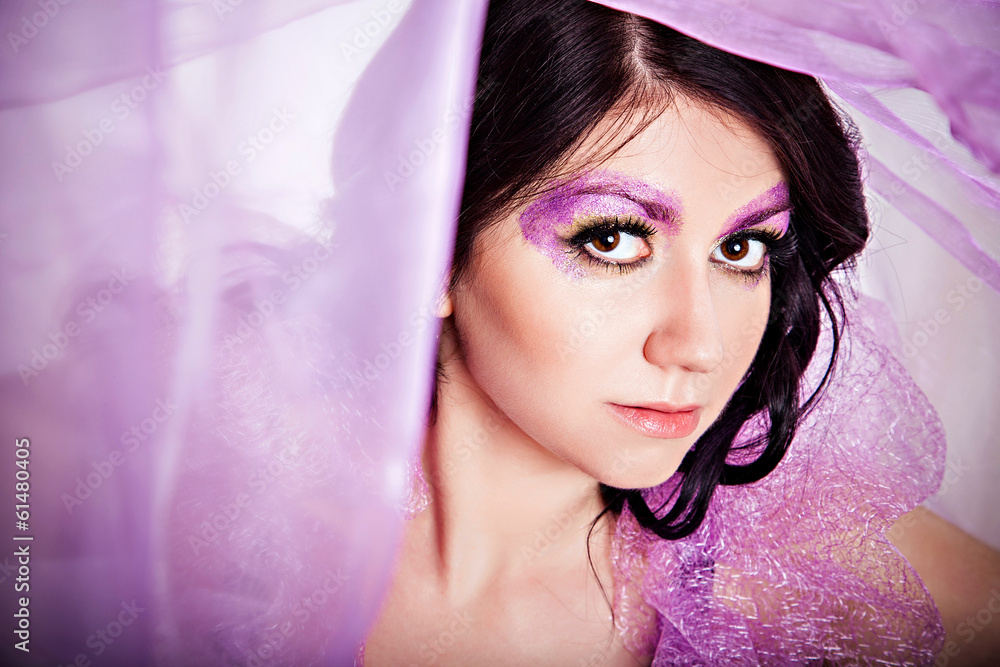 Girl with extreme violet make-up