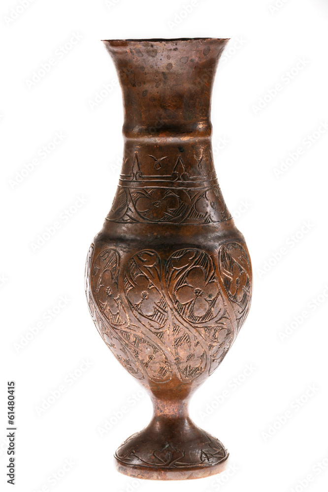 Ancient pitcher on a white background