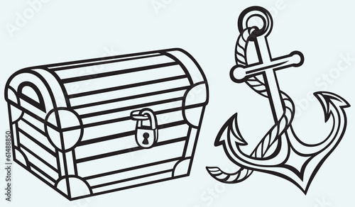 Chest and anchor isolated on blue background