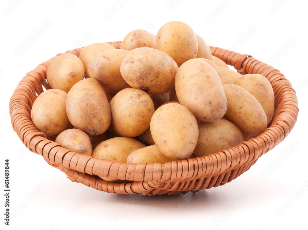 Potato tuber in wicker basket isolated on white background Potato tuber in wicker basket isolated on white background