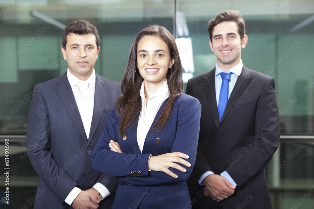 Businesswoman leader on the foreground of his team Businesswoman leader on the foreground of his team