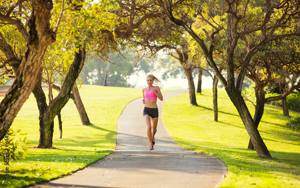 Woman running in the park Woman running in the park