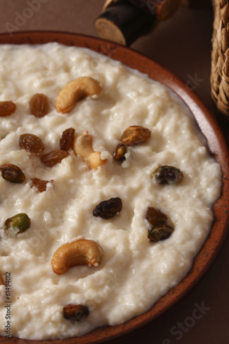 Zafrani kheer - Saffron flavored sweetened milk with rice photo