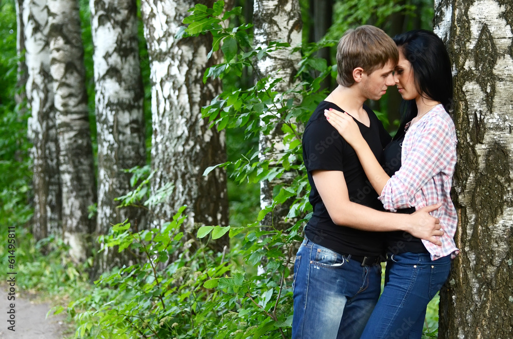 Enamoured young pair on the nature Enamoured young pair on the nature