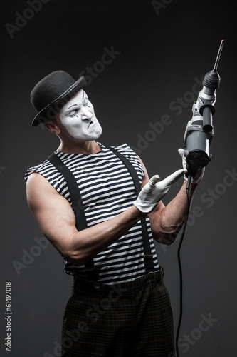 mime with hammer drill