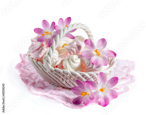Fototapeta Naklejka Na Ścianę i Meble -  Delicate meringue in a dish with blooming crocuses
