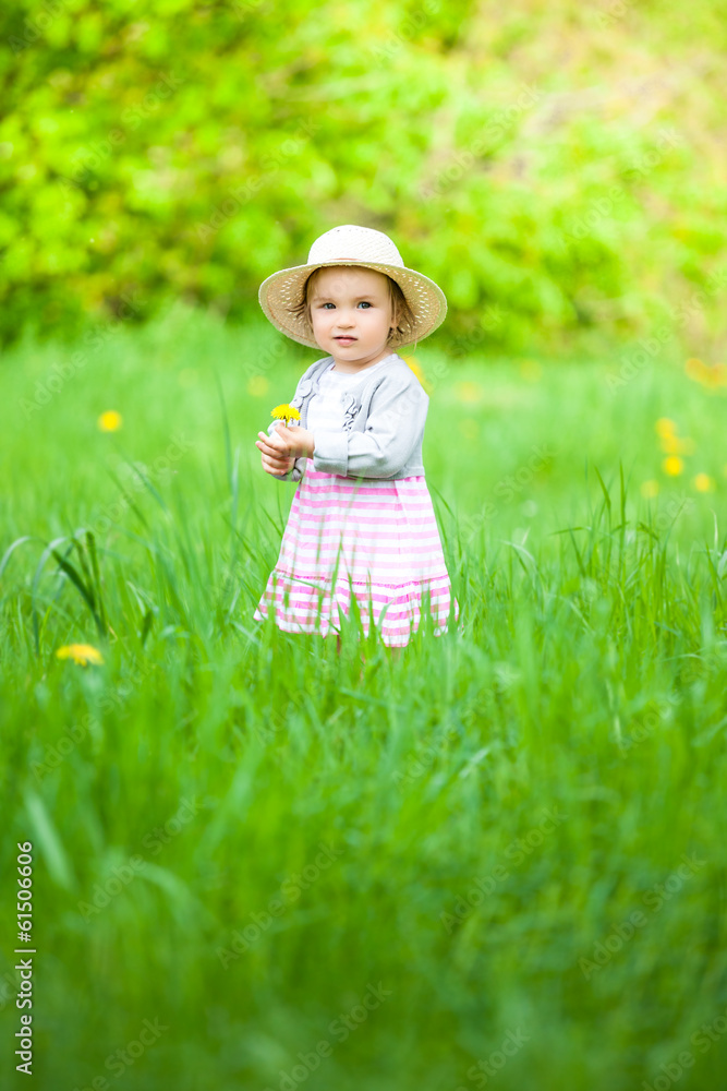 child in green