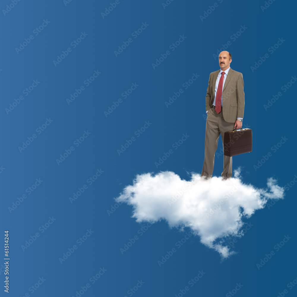 The businessman stands on a cloud The businessman stands on a cloud