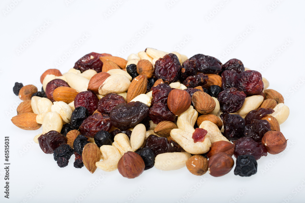 mixed nuts and dried fruits isolated on white background mixed nuts and dried fruits isolated on white background