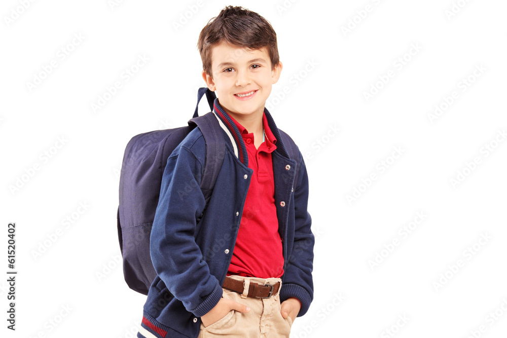 School boy with backpack standing and looking at camera School boy with backpack standing and looking at camera