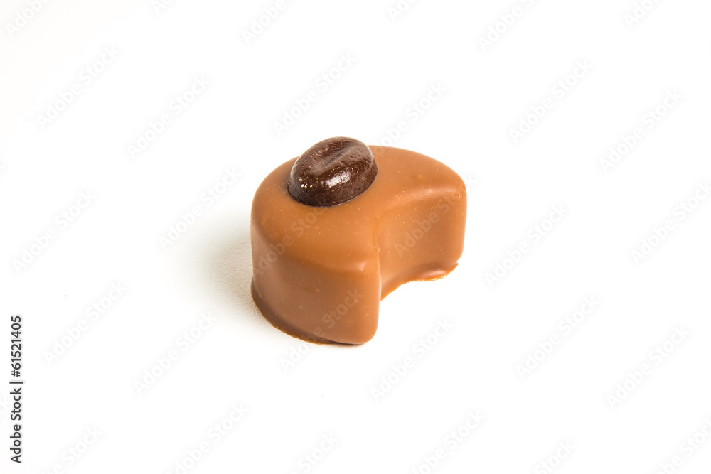 Milk chocolate with coffee isolated on white background Milk chocolate with coffee isolated on white background