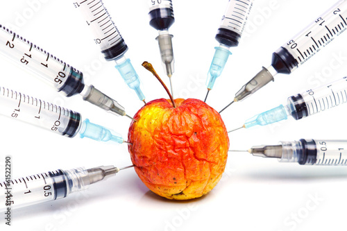 gmo / gmo food / injection of a rotten apple