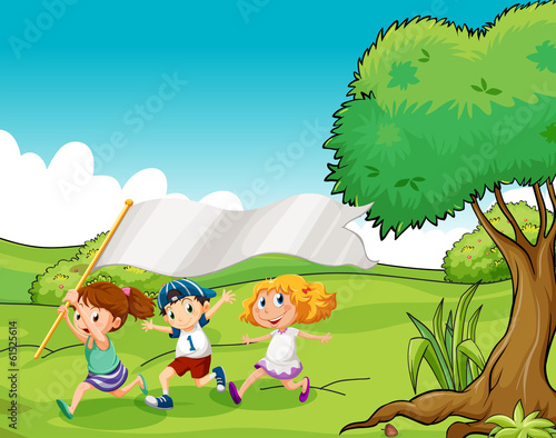 Three kids at the hilltop with an empty flag banner
