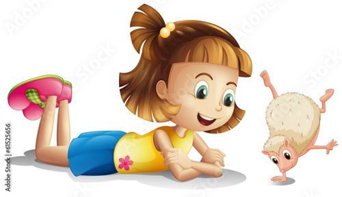 A young girl watching the wild animal