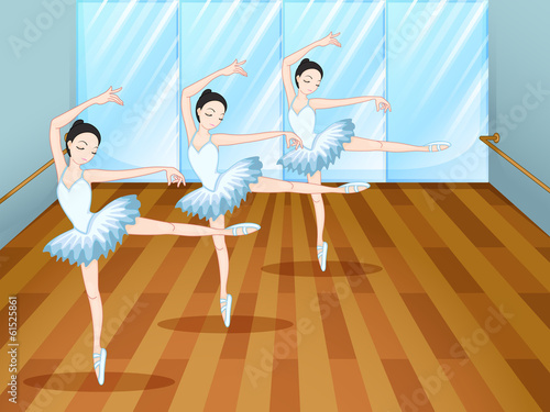 Three ballet dancers inside the studio