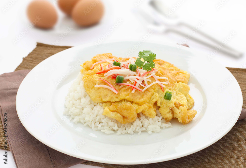 fried omelet topped on rice