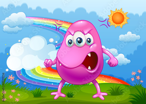 An angry monster with a rainbow in the sky