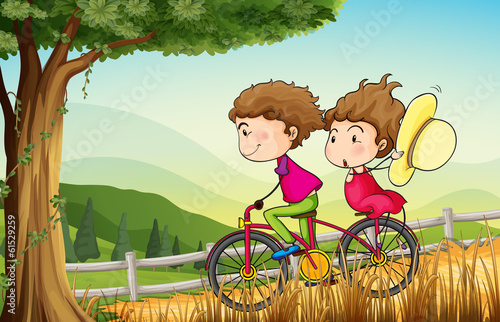 A couple riding on a bicycle