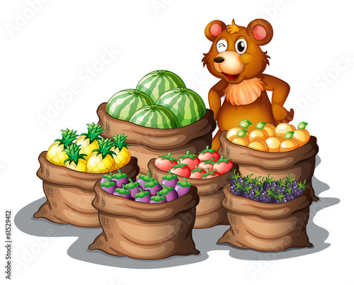 A bear with the newly harvested fruits photo