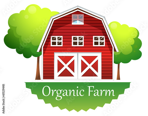 An organic farm label with a red wooden house