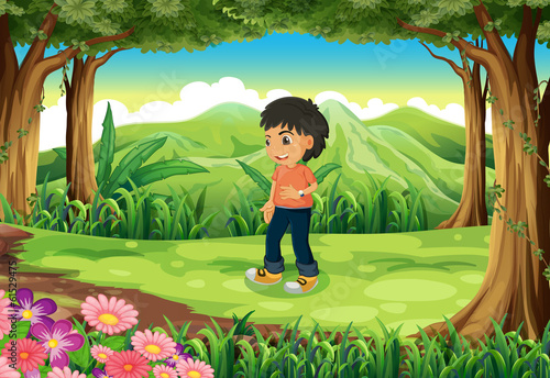 A teenager in the middle of the forest