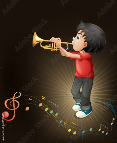A young man playing with his trombone