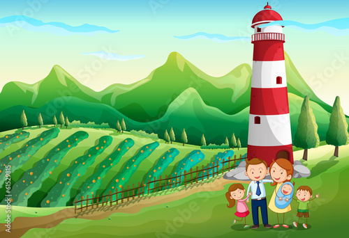 A family at the farm with a high tower
