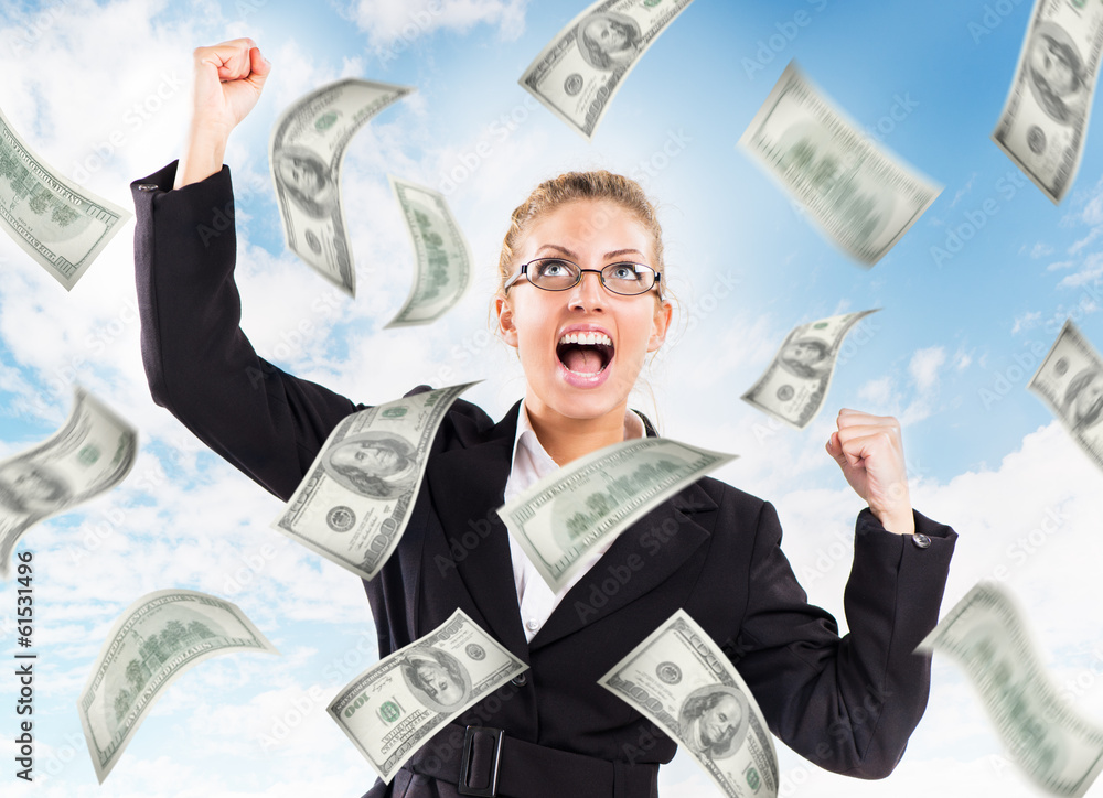 Happy Businesswoman under money rain.