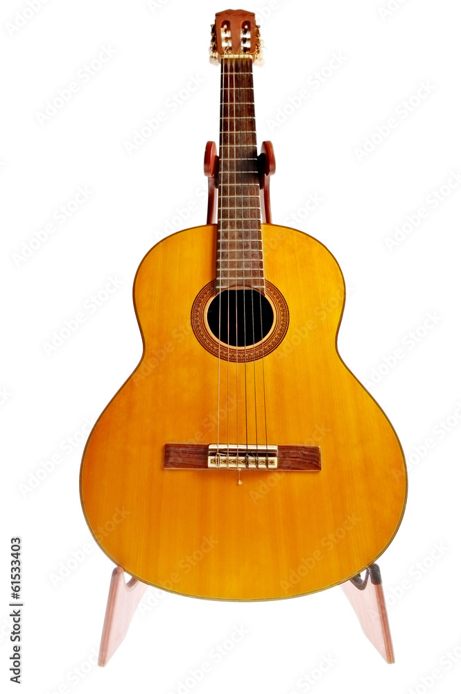 Obraz premium Used acoustic guitar isolated on white