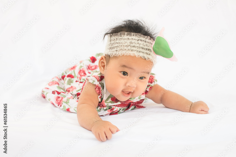 Cute baby smiling girl with rose headband Cute baby smiling girl with rose headband