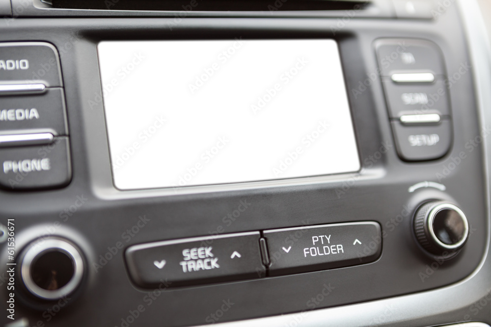 White blank display on the dashboard panel. Car interior