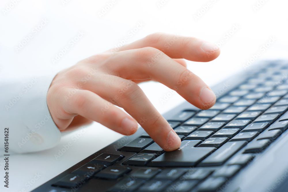 Close-up of typing male hands on keyboard