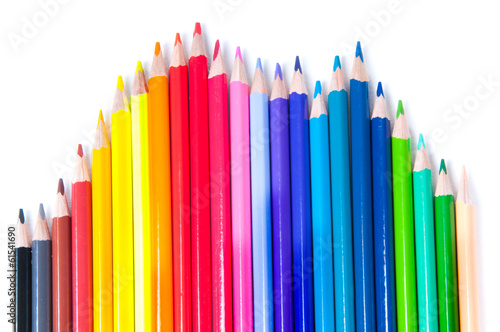 Multicolored pencils laid out in waves
