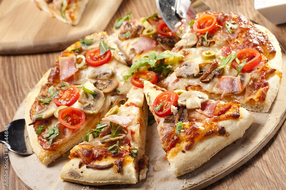 Pizza with ham and mushrooms