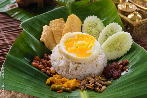 nasi lemak, a traditional malay curry paste rice dish served on