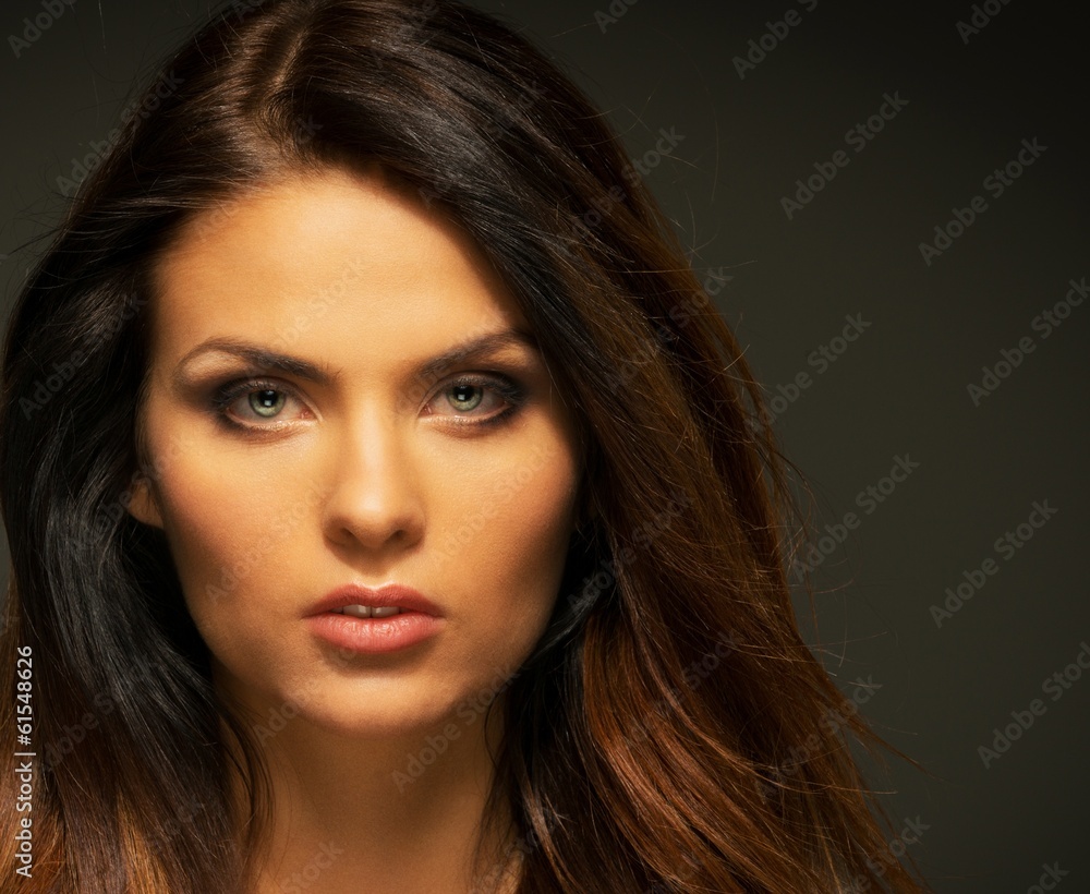 Fototapeta premium Seductive brunette woman with long hair