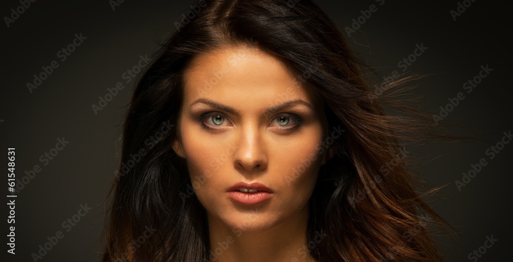 Fototapeta premium Seductive brunette woman with long hair