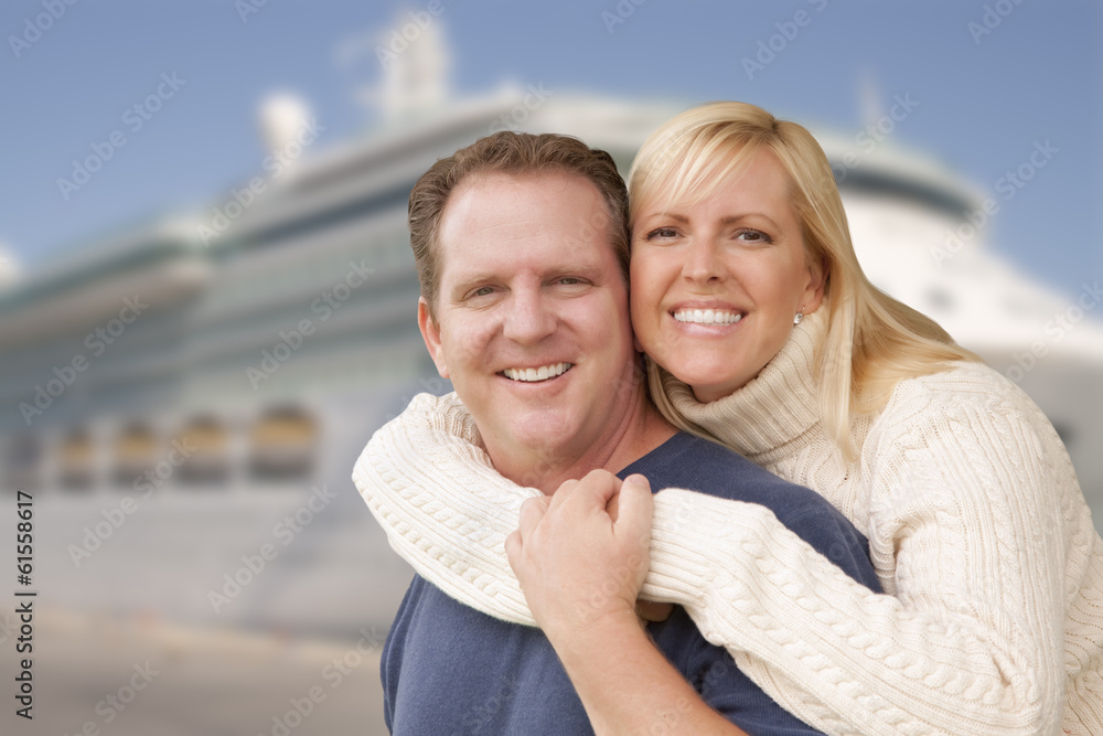Young Happy Couple In Front of Cruise Ship Young Happy Couple In Front of Cruise Ship