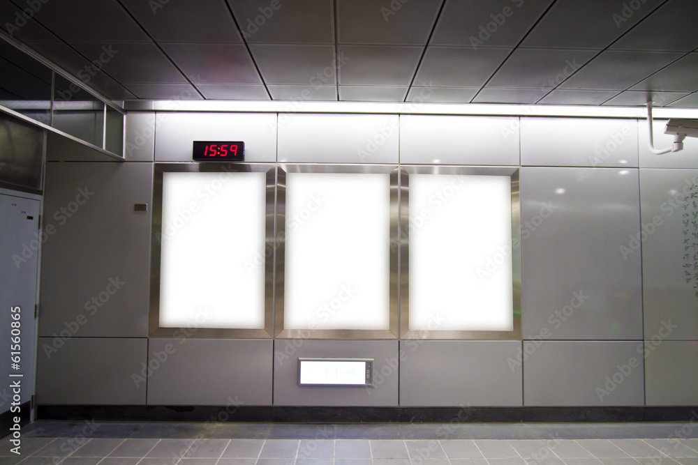 Blank billboard in metro station Blank billboard in metro station