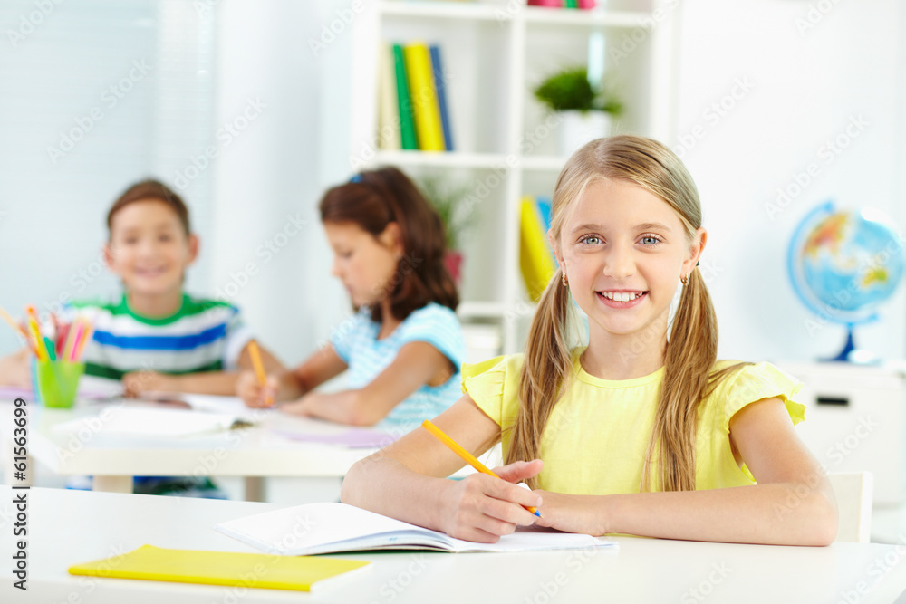 Schoolchild at desk Schoolchild at desk