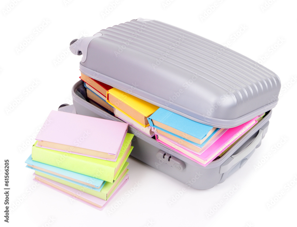 Suitcase with books isolated on white Suitcase with books isolated on white